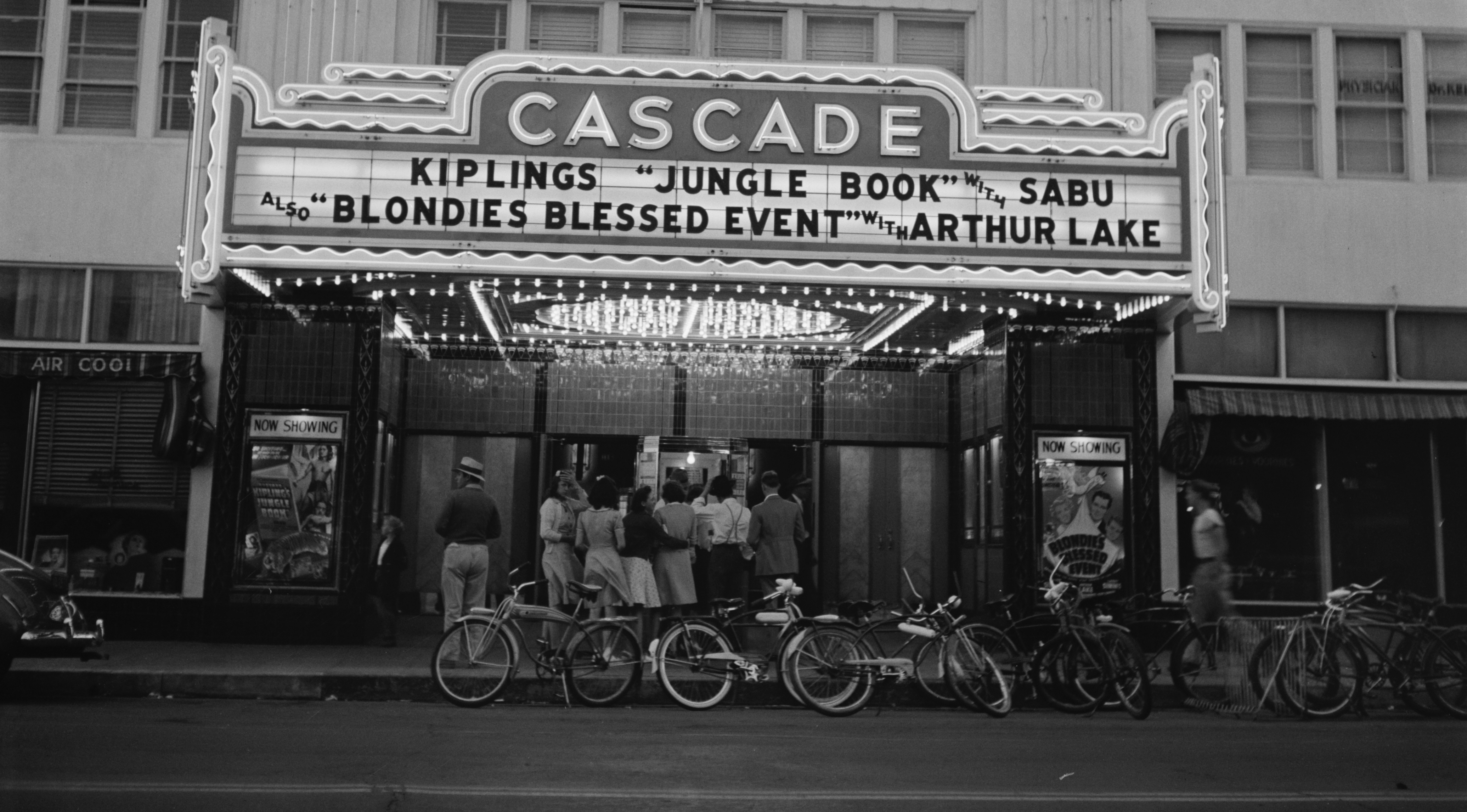 A well-used bike corral directly in front of the Cascade Theater in 1941.